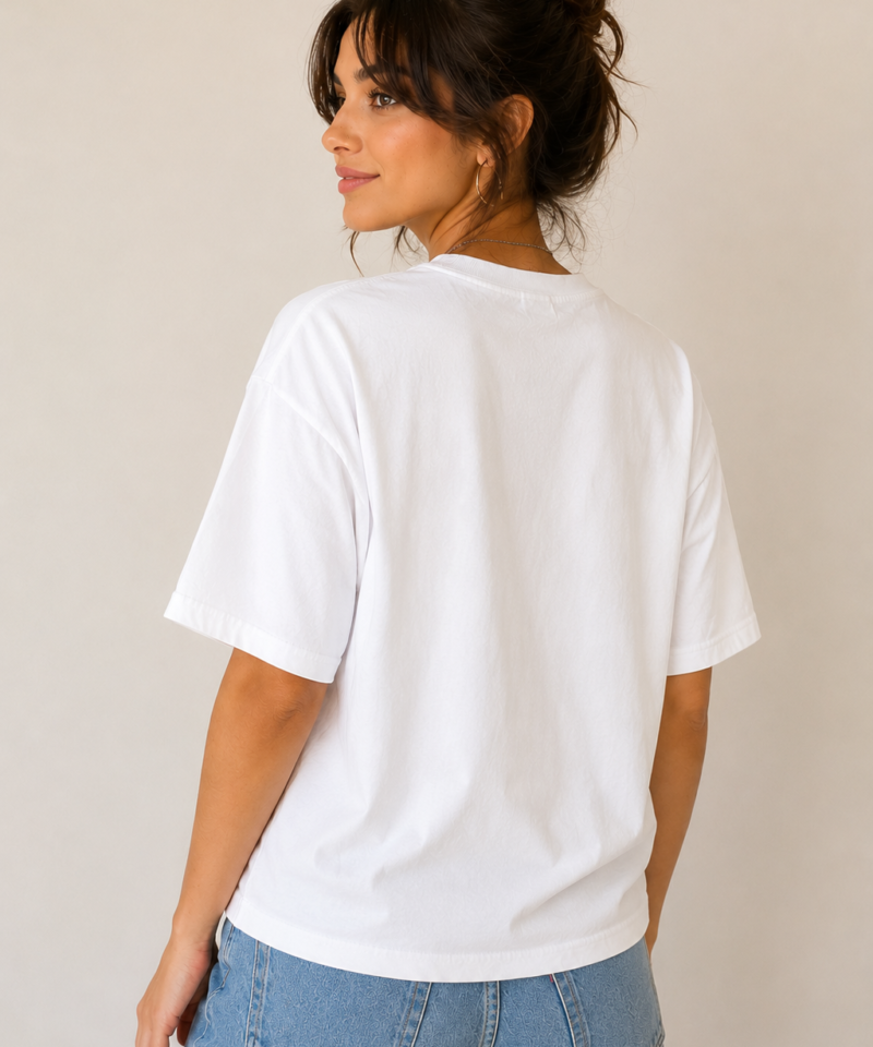 CASH Graphic T-Shirt worn by a model, back view showing the plain white back of the shirt